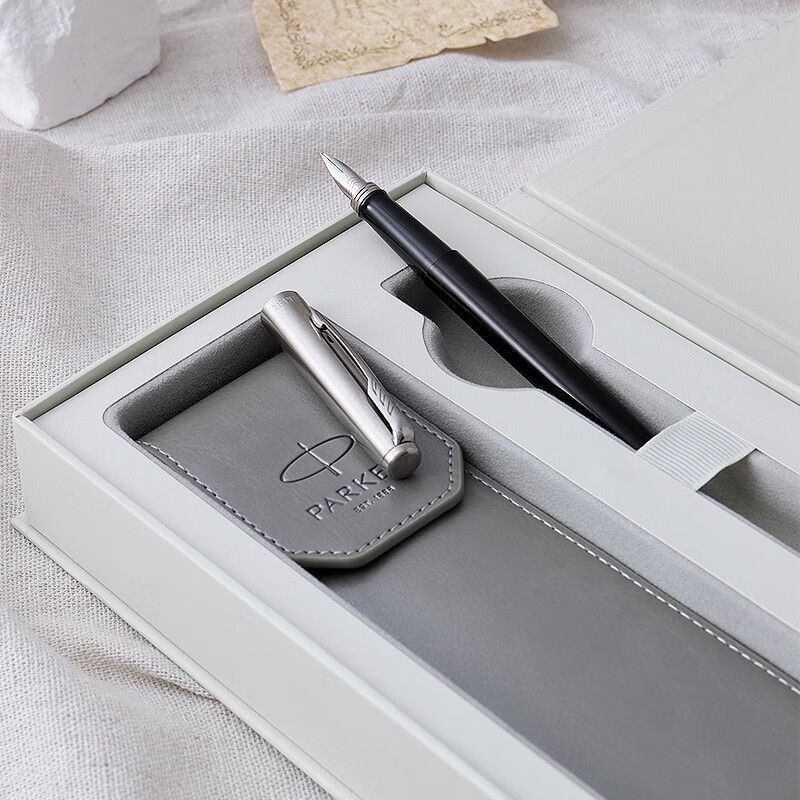 Parker fountain pen and light gray sleeve in gift box