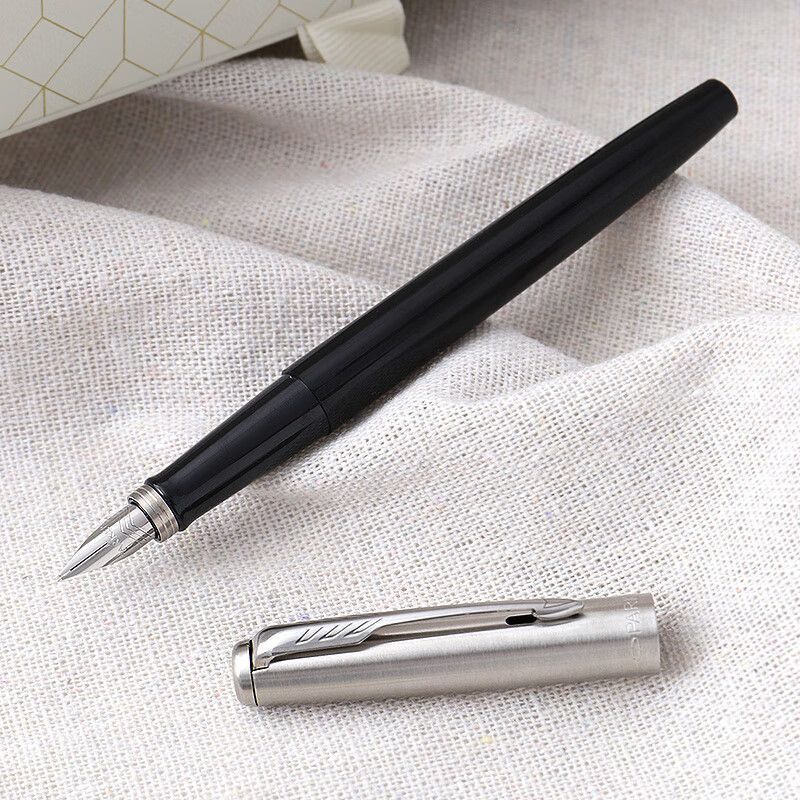 Close view of Parker Jotter black fountain pen and silver cap