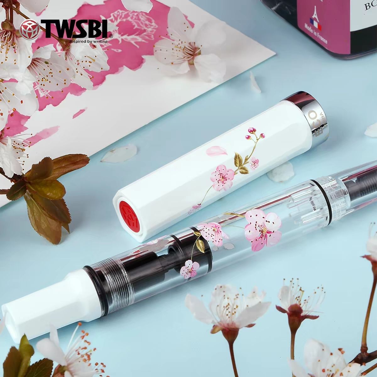 TWSBI ECO Sakura fountain pen uncapped with clear cherry blossom barrel and white cap