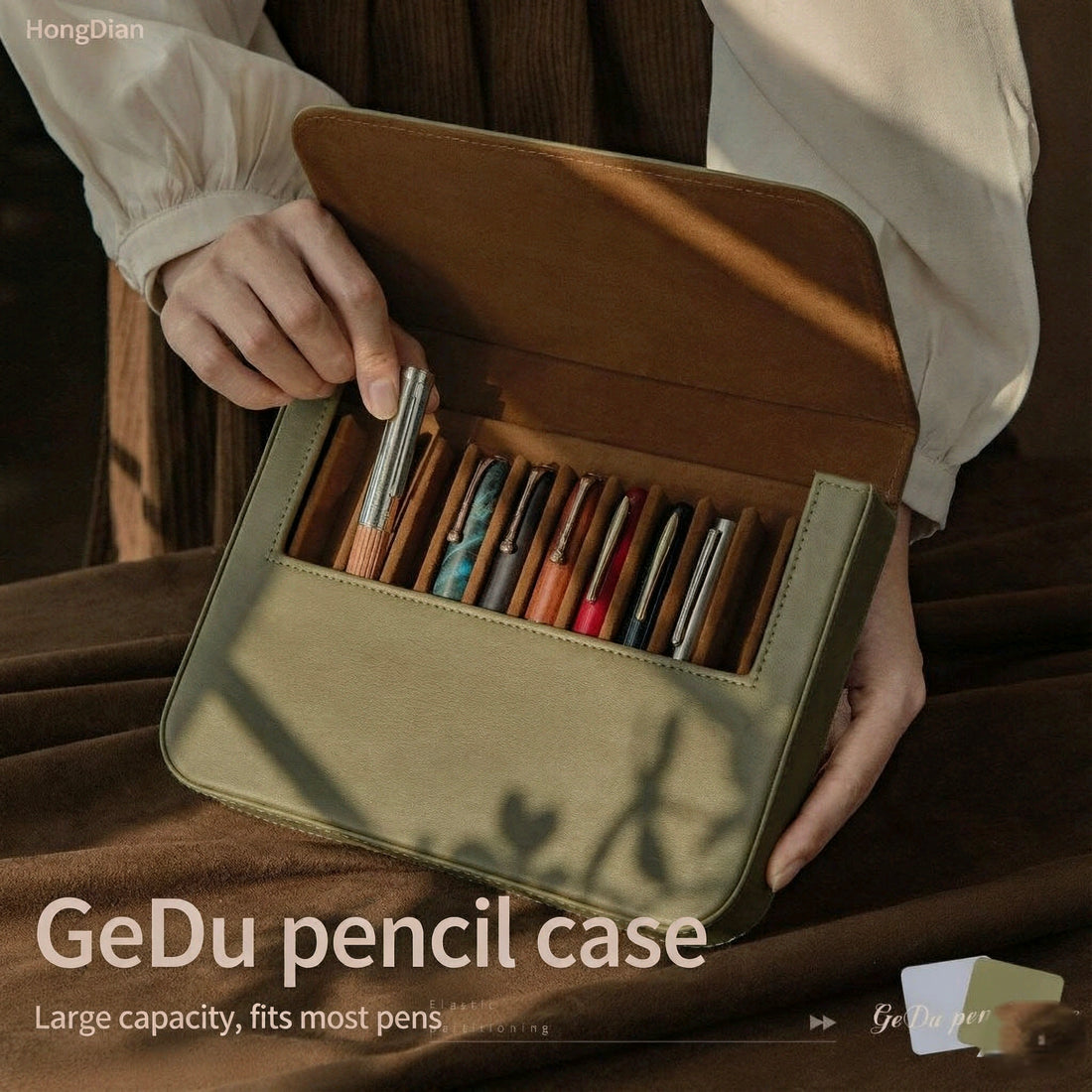 HongDian GeDu leather-style pen case holding a collection of pens