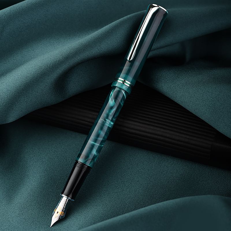 Hongdian teal fountain pen with cap posted and fountain nib visible