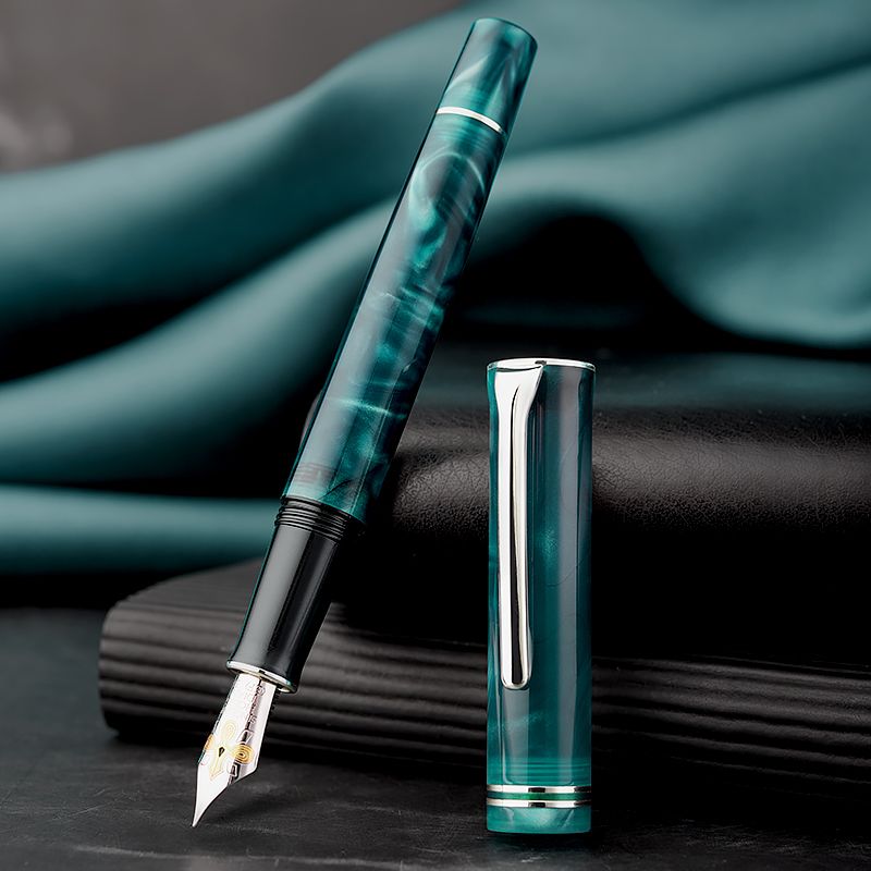 Hongdian teal fountain pen with cap posted and fountain nib visible
