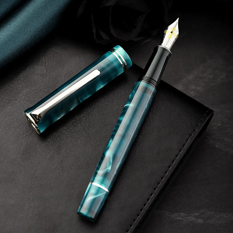 Hongdian teal fountain pen with silver-tone nib and matching cap
