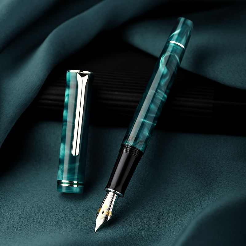 Capped Hongdian teal fountain pen with silver-tone clip
