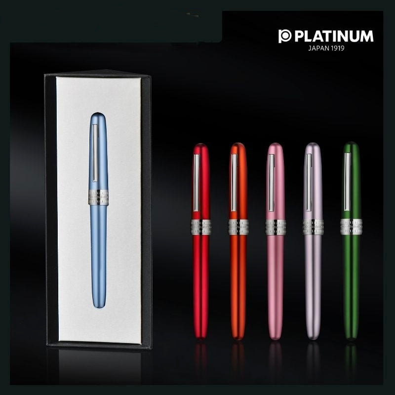 Platinum Plaisir fountain pens lined up next to triangular gift box