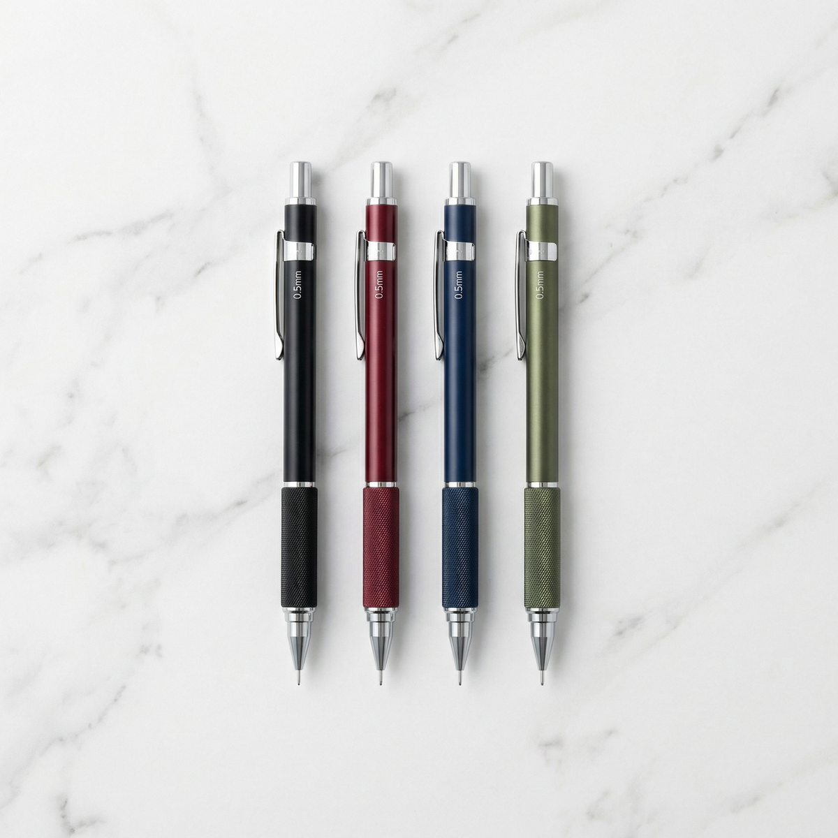 Tombow MONO Graph TUNE pencils flat lay on white marble