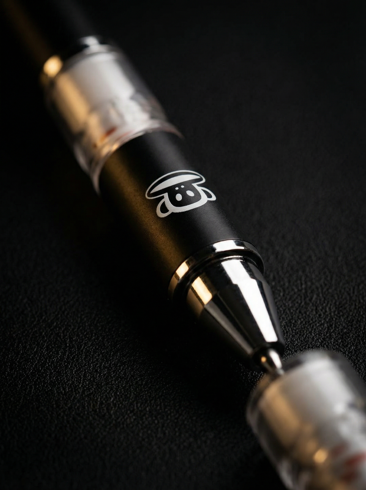Paul Frank Mechanical Pencil premium close-up macro shot of monkey logo and chrome tip